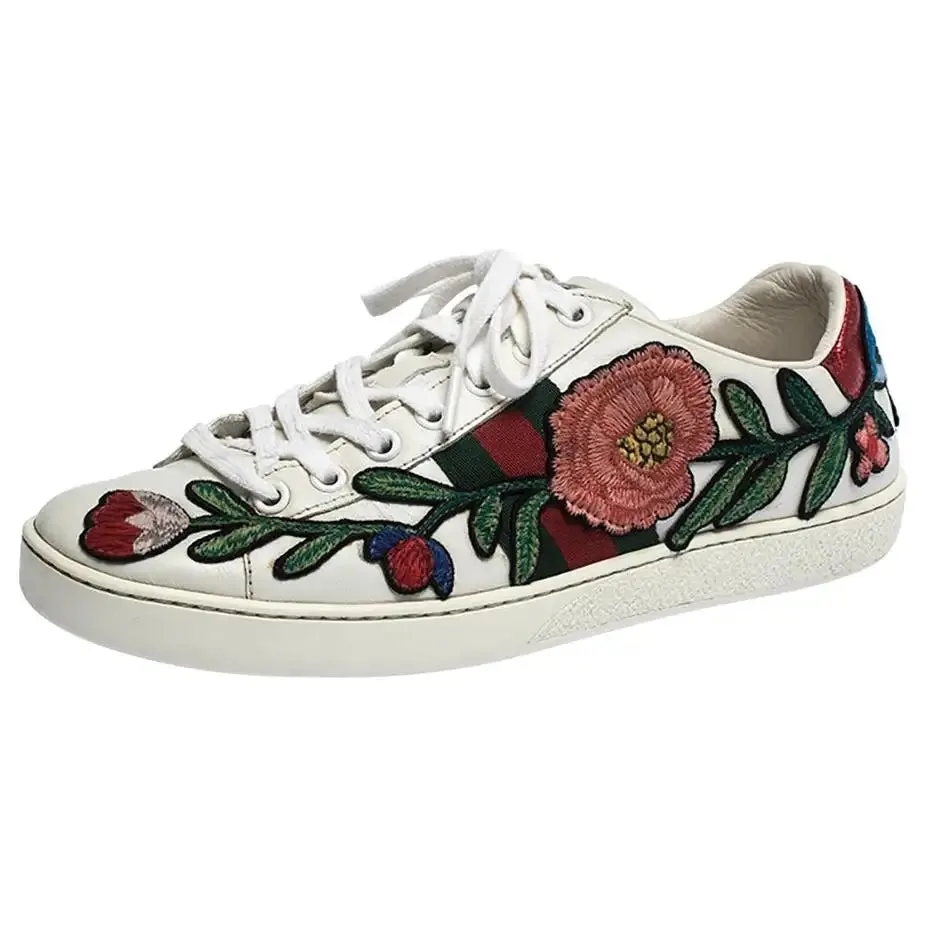 GUCCI ACE WEB FLOWER EMBROIDERED DISTRESSED SNEAKERS