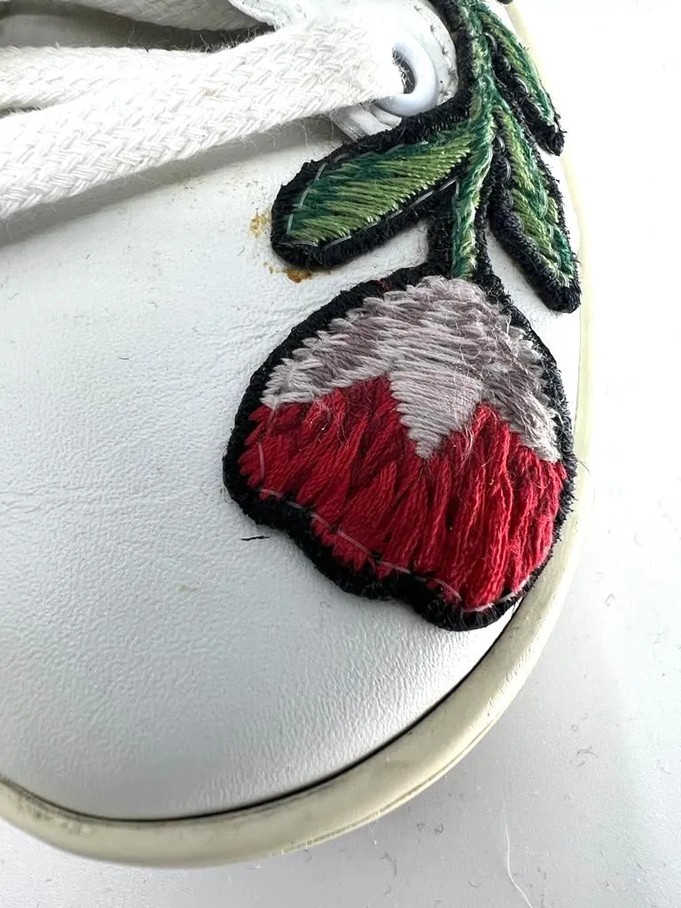 GUCCI ACE WEB FLOWER EMBROIDERED DISTRESSED SNEAKERS